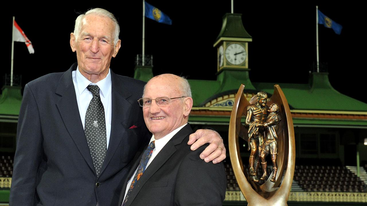 Legends Norm Provan (left) and Arthur Summons re-create their iconic “Gladiators” image. Picture: AAP