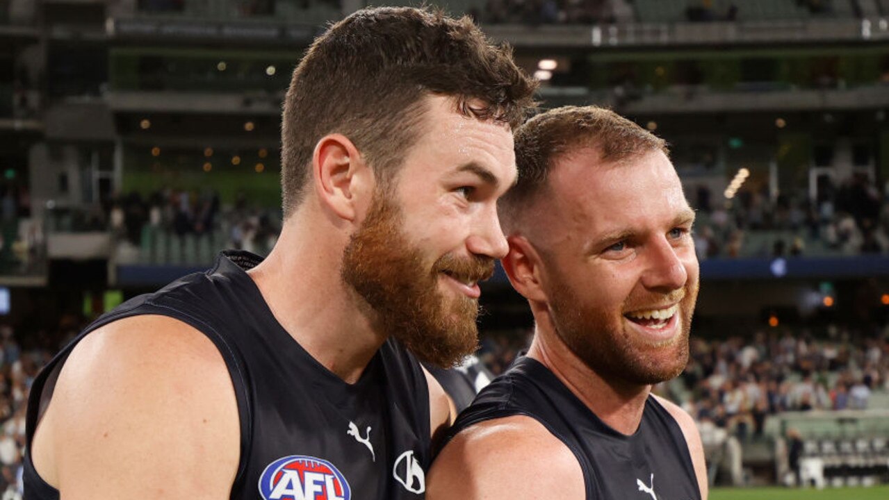 MELBOURNE, AUSTRALIA - MARCH 17: Mitch McGovern (left) and Sam Docherty of the Blues celebrate during the 2022 AFL Round 01 match between the Carlton Blues and the Richmond Tigers at the Melbourne Cricket Ground on March 17, 2022 In Melbourne, Australia. (Photo by Michael Willson/AFL Photos via Getty Images)