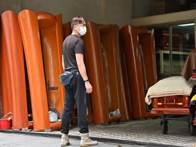 Hong Kong is on the verge of running out of coffins as morgues are overwhelmed with Covid-19 deaths. Picture: AFP