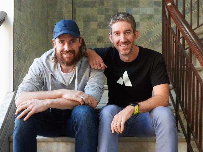 Mike Cannon-Brookes (baseball cap) and fellow founder of Atlassian, Scott Farquhar pictured together in their Sydney HQ