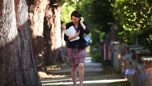 NSW Premier Gladys Berejiklian walking to catch the bus as she makes her way to work in Macquarie Street, Sydney. Picture: Phil Hillyard