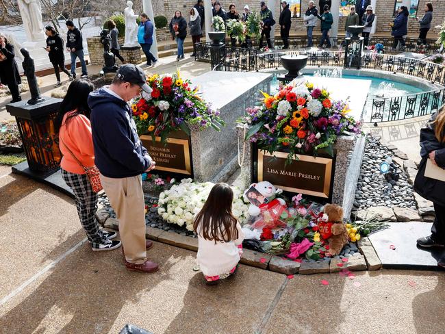 Fans visit the grave of Lisa Marie Presley during her memorial on January 22, 2023 in Memphis, Tennessee. Presley, 54, was the only child of American singer Elvis Presley. Picture: AFP