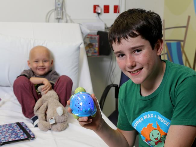 Bryce U'Ren 11yrs from Burleigh Heads has been nominated for a Pride of Australia award for his work fundraising and handing out nightlights to sick kids in hospitals, Bryce is pictured at the Lady Cilento Children's Hospital with patient Tanner Lousick 4yrs from Cairns, Brisbane Thursday 13th September 2018 Picture AAPimage/David Clark