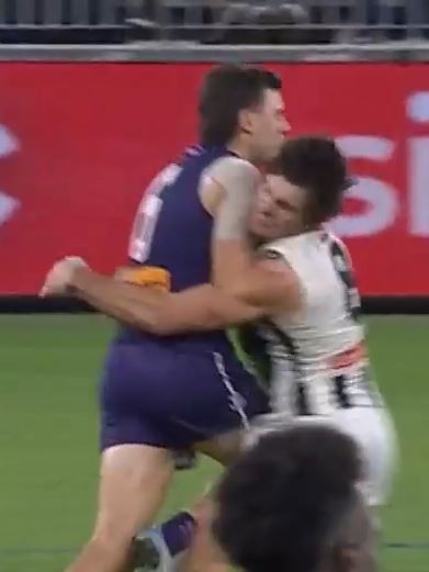 Jordan Clark and Lachie Schultz collide.