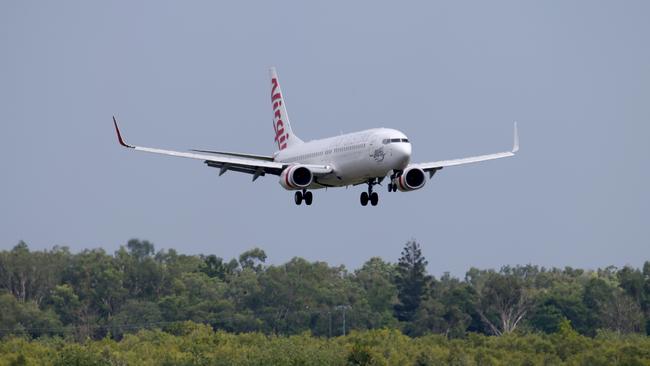 Aircraft at Cairns Airport,  Virgin Australia Boeing 737-800 registration number VH-YFG. Photo: Marc McCormack