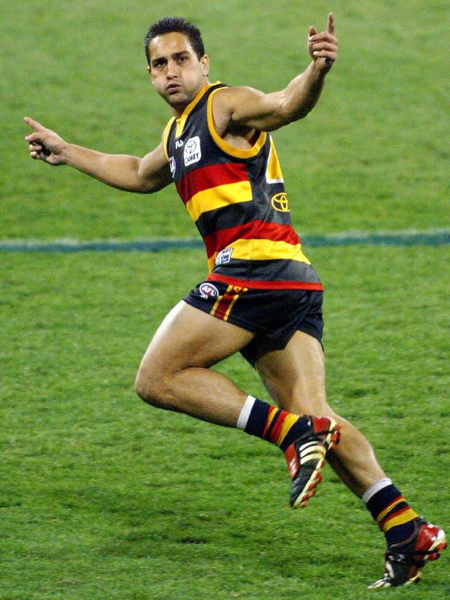 McLeod celebrates a goal in the 2002 semi-final match at the MCG.