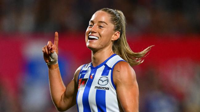 MELBOURNE, AUSTRALIA - NOVEMBER 30: Alice O'Loughlin of the Kangaroos celebrates kicking a goal during the AFLW Grand Final match between North Melbourne Tasmanian Kangaroos and Brisbane Lions at Ikon Park, on November 30, 2024, in Melbourne, Australia. (Photo by Quinn Rooney/Getty Images)