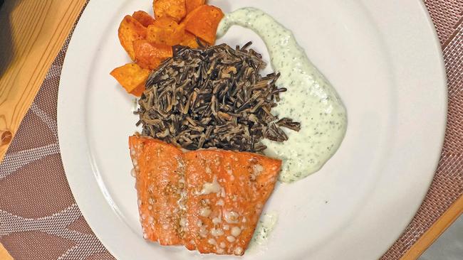 The wild Sockeye salmon grilled over alder wood with wild rice and roasted sweet potato was a standout dish. Picture: Vashti Newcomb.