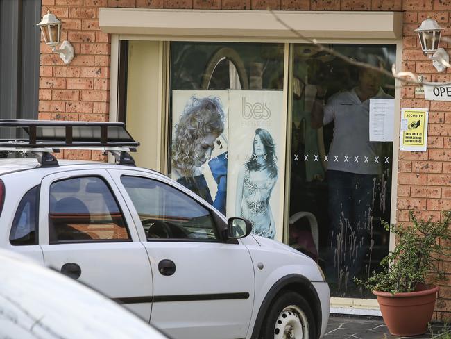 Minto terror/stabbing. Blood sprayed on the glass door of the hairdressing salon where the attacker bashed his head. Picture: Dylan Robinson