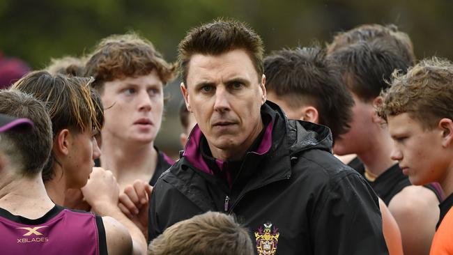 AFL great Matthew Lloyd coaches Haileybury College’s footy team in the APS. Photo: Andrew Batsch