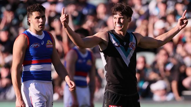 ADELAIDE, AUSTRALIA - JULY 06: Connor Rozee of the Power celebrates a goal during the 2024 AFL Round 17 match between the Port Adelaide Power and the Western Bulldogs at Adelaide Oval on July 05, 2024 in Adelaide, Australia. (Photo by James Elsby/AFL Photos via Getty Images)