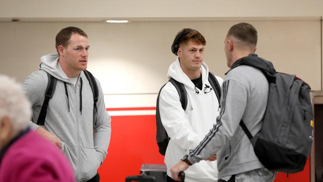 (L-R) Tim Glasby, Kalyn Ponga and Kurt Capewell at Sydney Airport after flying back from State of Origin 2 in Perth. Picture: Damian Shaw