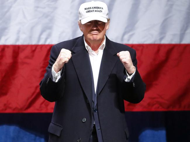 Donald Trump, pictured at a rally in Sterling Heights in the swing state of Michigan on Sunday, is fighting to the end. Picture: Paul Sancya/AP