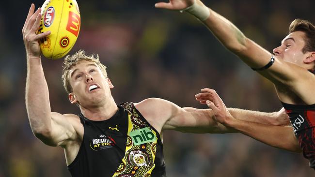 Tom Lynch juggles a mark against Essendon before suffering a hamstring injury. Picture: Michael Klein