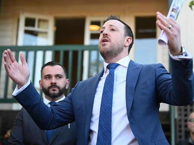 SYDNEY, AUSTRALIA - AUGUST 10: Jon Craven in action auctioning 56 Union Street, Tempe, which was bought by Ben Stewart and Jack Breen for $1,350,000. (Photo by James Gourley/The Sunday Telegraph)