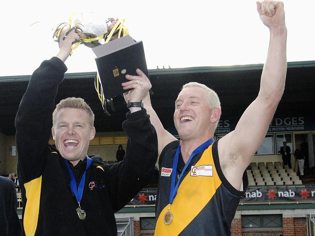 Heidelberg coach Phil Plunkett and captain Blair Harvey celebrate the 2007 premiership. Picture: Mark Frecker