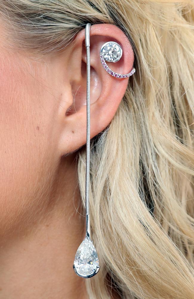 The $1.6m ear cuff incorporates several stunning, rare Argyle pink diamonds and a three carat white diamond.. Photo: Richard Gosling