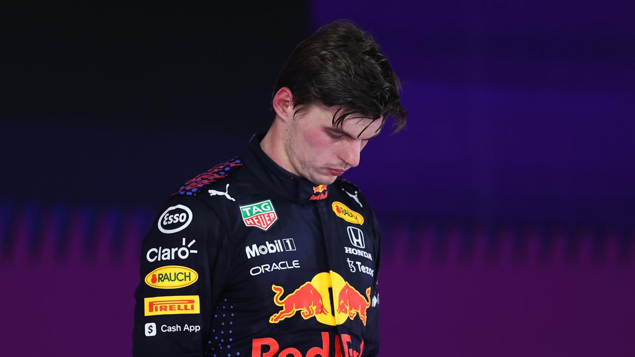 JEDDAH, SAUDI ARABIA - DECEMBER 05: Second placed Max Verstappen of Netherlands and Red Bull Racing stands on the podium during the F1 Grand Prix of Saudi Arabia at Jeddah Corniche Circuit on December 05, 2021 in Jeddah, Saudi Arabia. (Photo by Lars Baron/Getty Images)