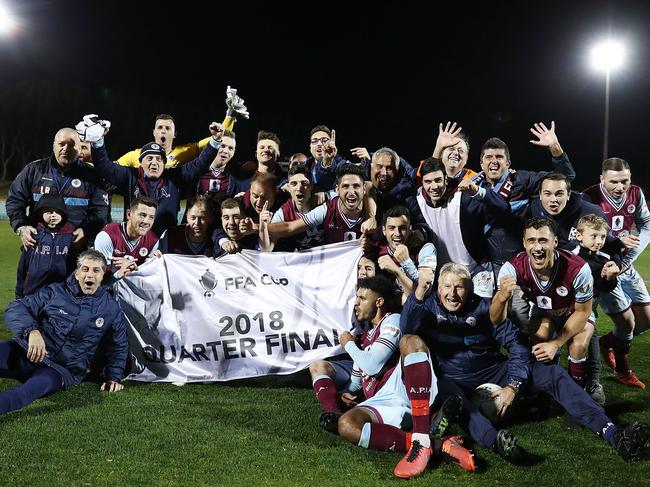 SYDNEY, AUSTRALIA - AUGUST 21:  APIA Leichhardt Tigers players celebrate victory in the FFA Cup round of 16 match between APIA Leichhardt Tigers FC and Melbourne Victory at Leichhardt Oval on August 21, 2018 in Sydney, Australia.  (Photo by Mark Metcalfe/Getty Images)