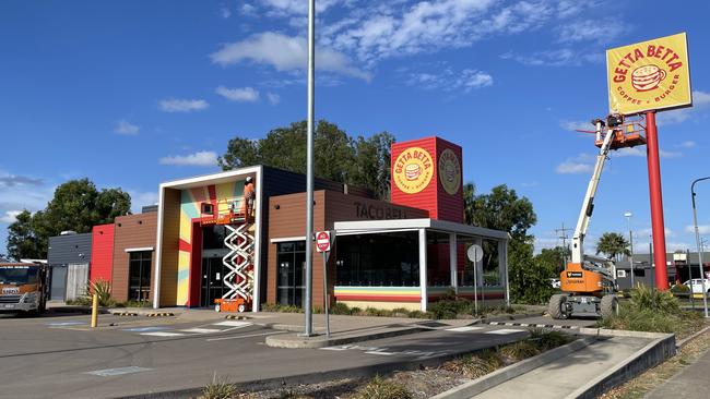 Signwriters were spotted updating the signage and exterior of the former Taco Bell restaurant and drive through to Getta Betta. Picture: Leighton Smith.