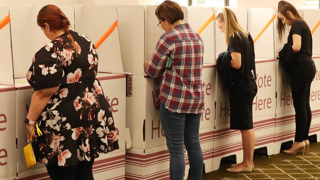 Voters at City Hall in Brisbane, where social distancing measures are in place. Picture: Liam Kidston.