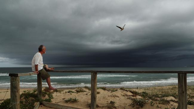 Dark skies above Cronulla beach. Picture: Brett Costello