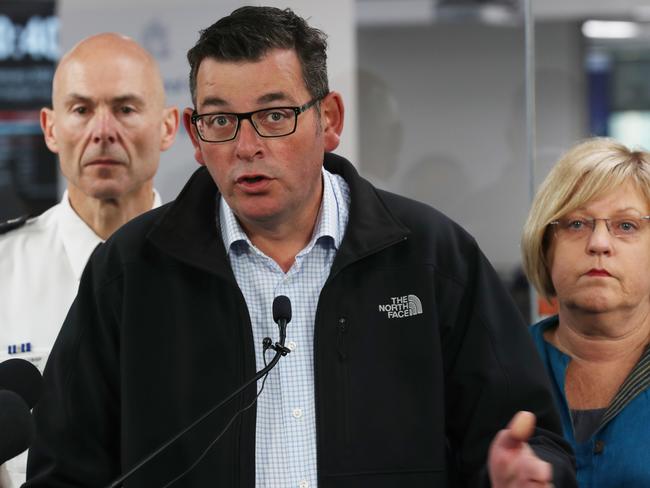 Victorian Premier Daniel Andrews with Emergency Management Commissioner Andrew Crisp and Minister for Police Lisa Neville. Picture: AAP