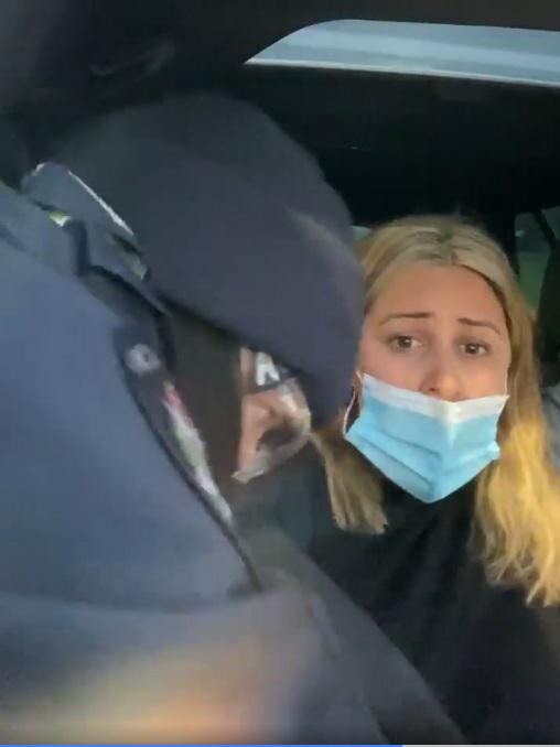 Natalie Bonett being dragged from her car by police at a checkpoint at Wallan. Picture: Facebook