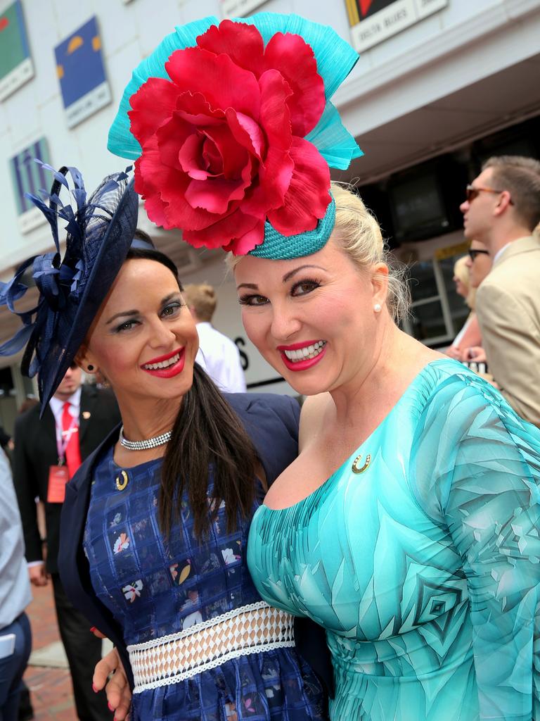 Bianca Black and Eva Kovacs enjoy the sun at Flemington. Picture:Ian Currie