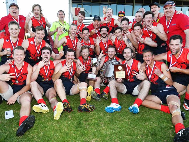 Jubilant Flagstaff Hill celebrate winning their third premiership in a row after the Southern Football League grand final - Flagstaff Hill v Reynella at Hickinbotham Oval Saturday September 22 .(Image AAP/Mark Brake)