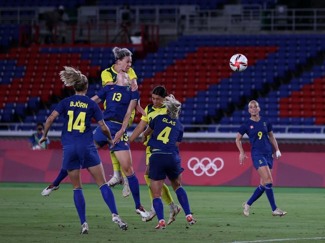 Alanna Kennedy rises for a header. (Photo by Koki Nagahama/Getty Images)