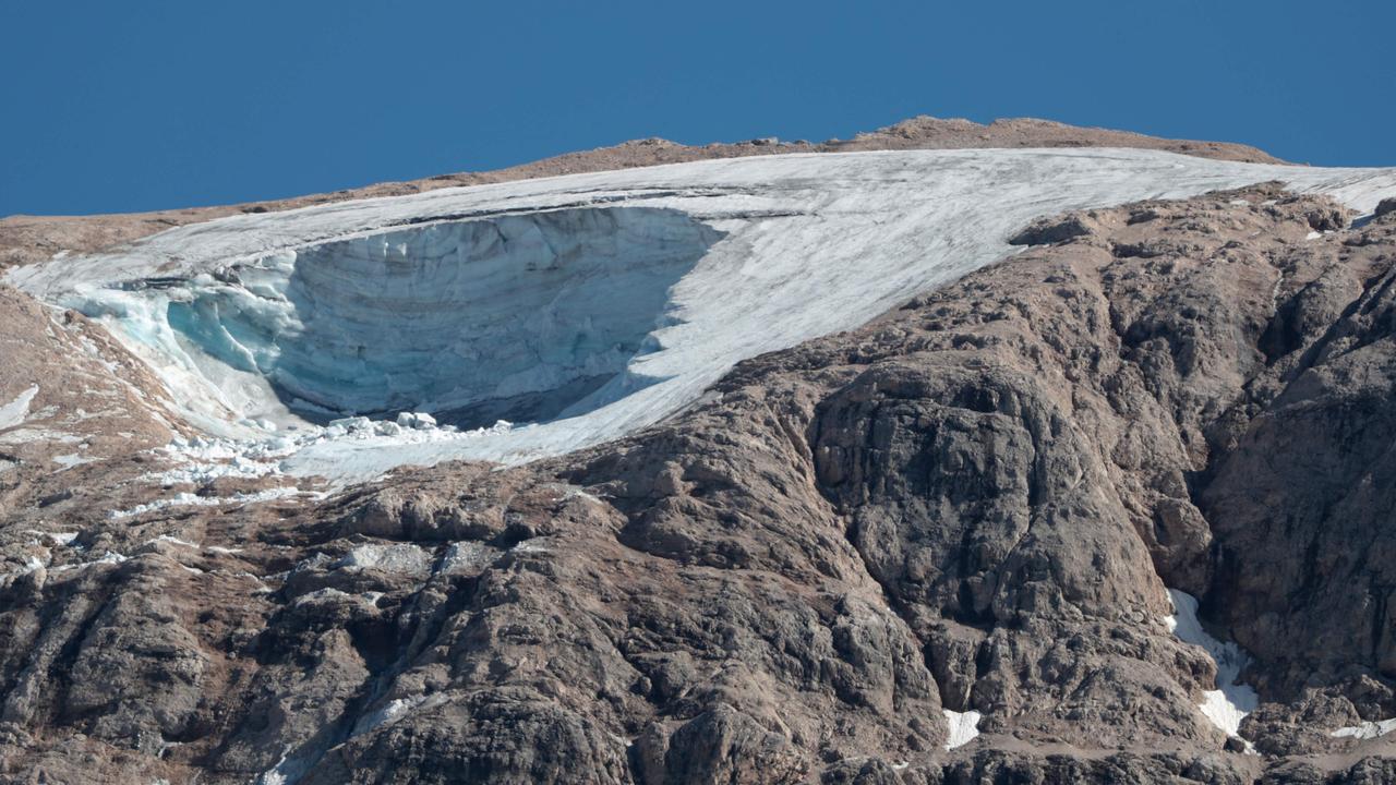 This photograph taken on July 4 from Canazei, shows the ice serac that collapsed on the Marmolada mountain, near Punta Rocca. Picture: Pierre Teyssot/AFP