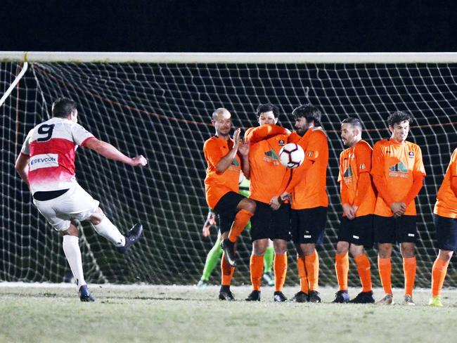 Caloundra's Ethan Galbraith kicks for goal against Buderim last year. Photo: Warren Lynam