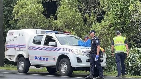 A 50-year-old man and his dog were found dead in a submerged car at Currumbin Valley after driving into flood waters. Picture: 7NEWS