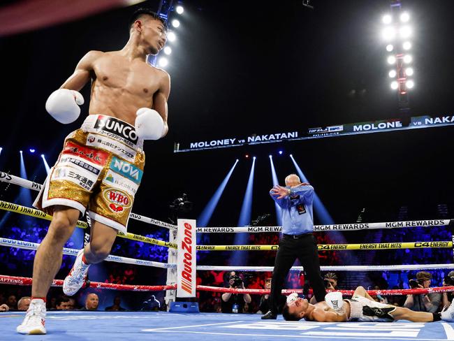 Australia’s Andrew Moloney hits the canvas in his fight against Junto Nakatani of Japan. Picture: Sarah Stier/Getty Images/AFP