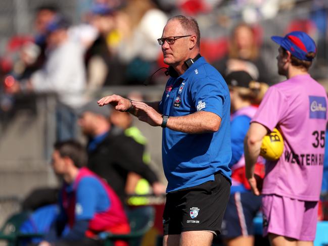 Former Bulldogs coach Nathan Burke speaking to his charges in 2023. Picture: Dylan Burns/AFL Photos via Getty Images.