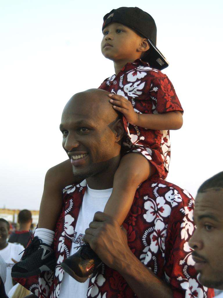 Lamar Odom of the Miami Heat and his son attend the Miami Heat Family Festival on February 23, 2003 in South Beach. Picture: Getty