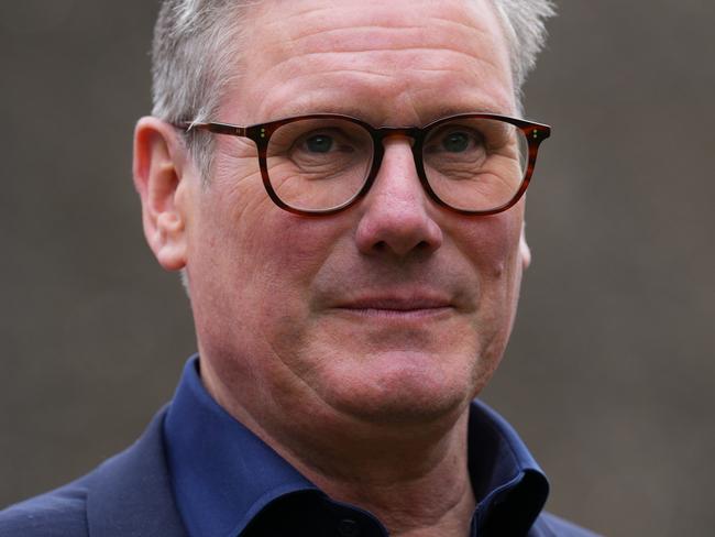 HITCHIN, ENGLAND  - JULY 1: Labour Leader, Sir Keir Starmer, reacts as he visits Hitchin Town Football Club on July 1, 2024 in Hitchin, England. Labour is still riding high in the polls with a 20-point lead over the Conservative Party. (Photo by Carl Court/Getty Images)