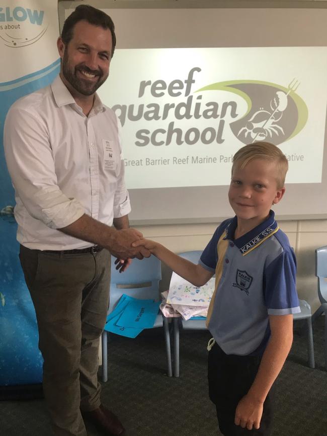 Grade 3 Kalkie State School student Thomas Rehbein meets with Josh Thomas after he invited him to visit the school during a videolink on Science Week last year.