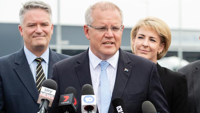 Australian Prime Minister Scott Morrison (centre) addresses the media in Perth on Friday, March 8, 2019. (AAP Image/Richard Wainwright) NO ARCHIVING