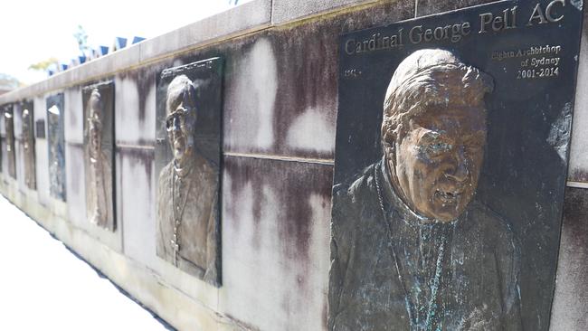 A brass plague of George Pell on the outer walls of St Mary’s Cathedral, Sydney. Picture: John Grainger