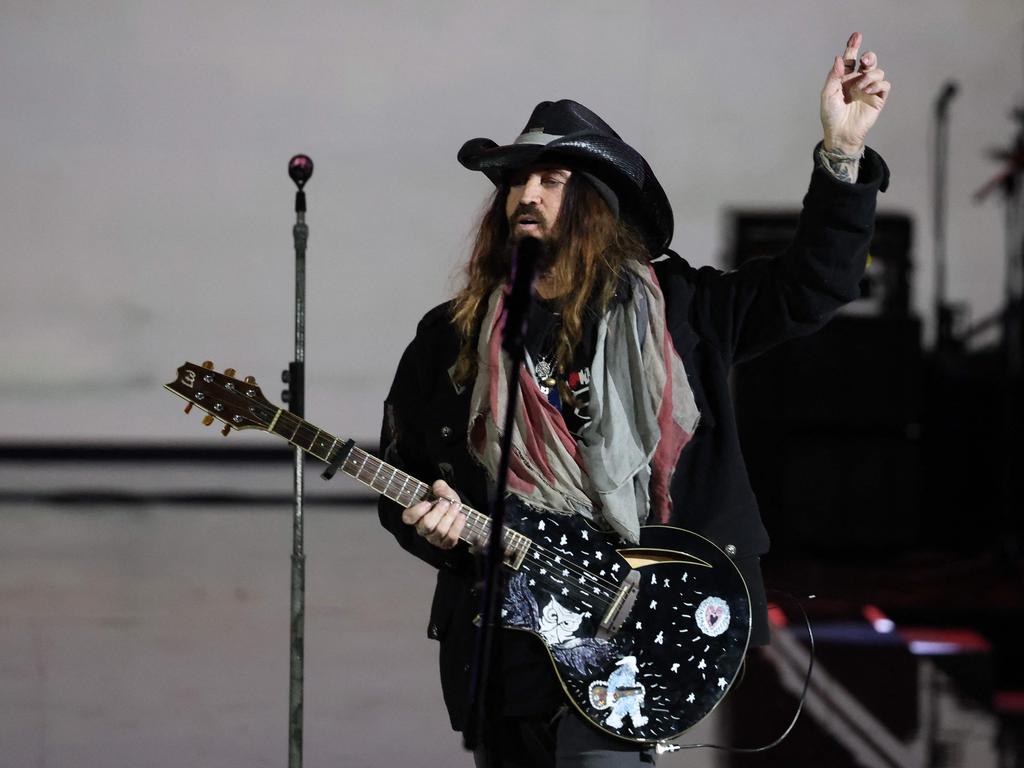 Billy Ray Cyrus blamed malfunctioning equipment on his disastrous performance at an inauguration event. Picture: Getty Images via AFP