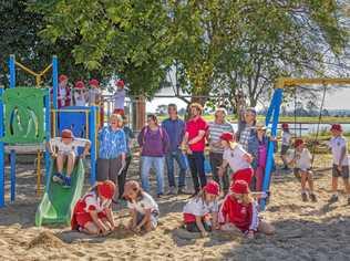 NOT FORGOTTEN: Members of Ulmarra Village Inc and students from Ulmarra Public School gather at Bailey Park as Clarence Valley Council plans for the riverfront redevelopment. Picture: Adam Hourigan