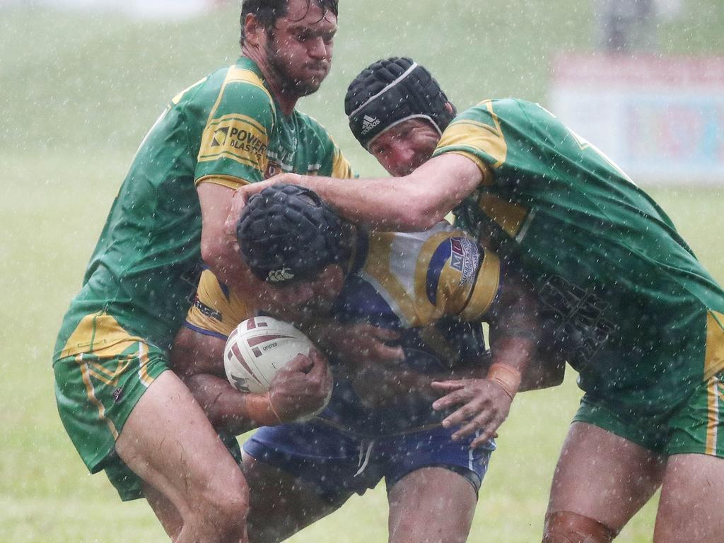 Kangaroos' Alphonse Gima pushes his way through the Gladiators defence in the Cairns and District Rugby League (CDRL) match between the Kangaroos and the Mareeba Gladiators, held at Vico Oval, Mooroobool. Picture: Brendan Radke
