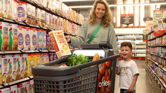 *EDITORIAL USE ONLY* Melbourne mum Rebecca Karo with son Imri with the Coles Smart Trolley. Picture: NewsWire Handout