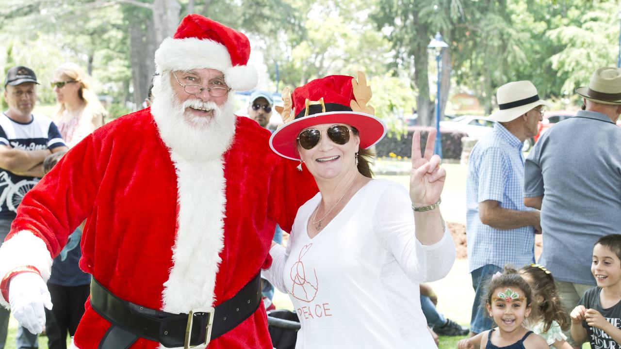 (From left) Santa Claus and Genevieve Allpass at the PEACE Christmas party. Monday, 3rd Dec, 2018.