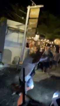 Aussies beaten with sticks and bar stools by angry Bali mob