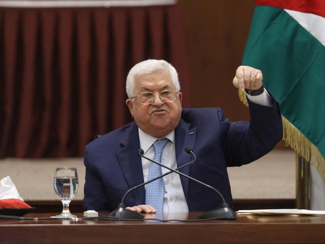 Palestinian President Mahmoud Abbas speaks during the Palestinian leadership meeting at his headquarters in the West Bank city of Ramallah, on May 19, 2020. - The Palestinian President again threatened to end security coordination with Israel and the United States, saying Israeli annexation would ruin chances for peace. (Photo by Alaa BADARNEH / POOL / AFP)