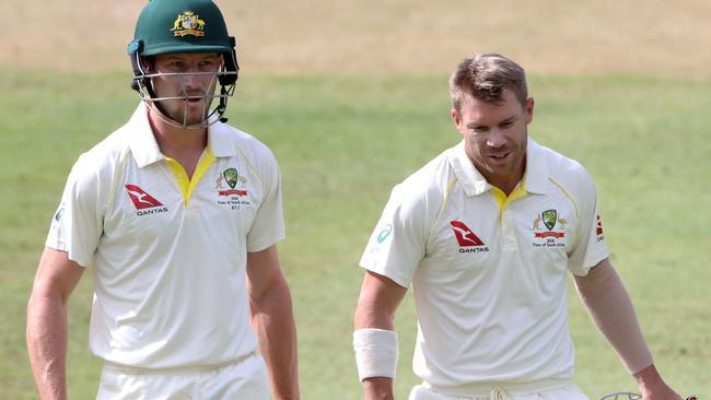 Cameron Bancroft and David Warner look for a hole to swallow them up.