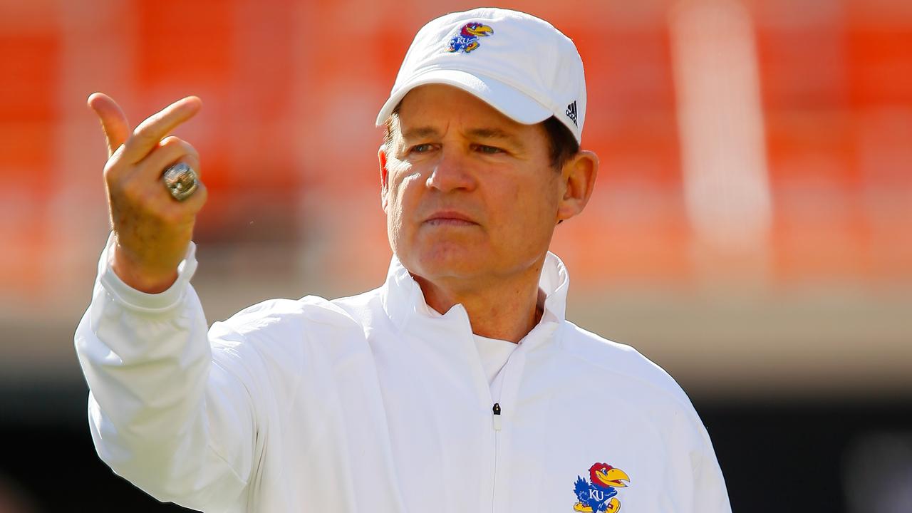 Kansas fired coach Les Miles on Tuesday following reports of misconduct towards students at an old job. (Photo by Brian Bahr/Getty Images)